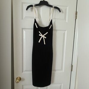 Maggy London, black with cream bow detail.
